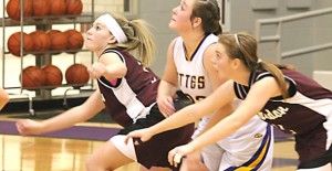 JV Lady Bronocs Abby Durham (33) and Haley Ferguson (3) get ready to rebound a free throw during last Friday’s game against Panhandle. Courtesy Photo / Melody Hysinger