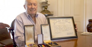 World War II veteran Joe Robinson of Clarendon with his medals for service to his country. Enterprise photo / Ashlyn Tubbs