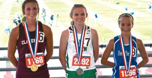 Clarendon High School senior Audrey Shelton (left) smiles with her medal along side the second and third place finishers in the 3200 at the state track meet last week. Courtesy PHoto / Melanie Shelton