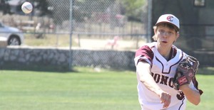 Dusty Rice pitches during the Broncos playoff game against Lockney. Enterprise photo / Kari Lindsey