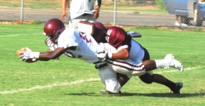 Charles Mason dives for a touch down at the first scrimmage of the football season against Bovina on Friday,  July 16th. Photo / Alice Cobb