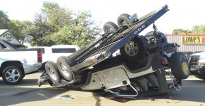 A Jeep rests on its top after a Monday afternoon wreck near Dairy Queen. Enterprise Photo / Ashlee Estlack