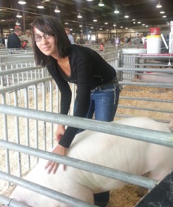 Donley County’s Misti Scott stands with her pig at last week’s Tri-State Fair in Amarillo. Courtesy Photo / Chardy Craft