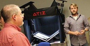 Publisher Roger Estlack and archivist Rob Weaver with a scanner at the TTU Southwest Collection. Enterprise Photo / ashlee Estlack