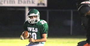 Senior Jake Owens carries the ball in the Owls Homecoming victory over Lazbuddie. Enterprise Photo / Kari Lindsey