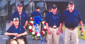 Donley County veterans Joe Robinson (seated) and Bufford Holland (second from right) attended an honor flight in Washington, DC, last month. Courtesy photo