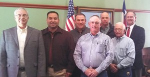 County Judge Jack Hall, Cielo representative Robert Peña, Commissioner Mark White, Commissioner Dan Sawyer, Commissioner Andy Wheatly, Commissioner Donnie Hall, and attorney James Wester. Enterprise Photo / Roger Estlack