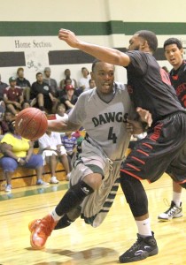 Clarendon College Bulldog Hershell Grant, a sophomore from Washington, DC, drives for the goal during the Lawrence Overcast Tournament last Saturday. Enterprise Photo / Roger Estlack