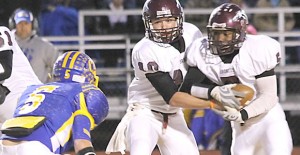 The Broncos faced the Bobcats Friday, November 1 in Sunray. Pictured Chance McAnear hands off to Charles Mason. The boys face off against Memphis in the last District play next Friday at 7:00 pm. 