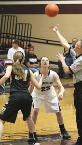 Ryann Starnes gets ready to jump for the ball at the opening.Courtesy Photo / Melody Hysinger