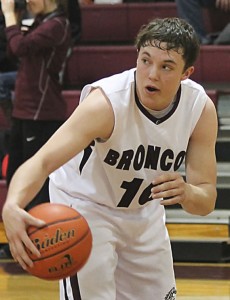 Chance McAnear handles the ball during the Broncos game against Vega last Friday. Courtesy Photo / Melody Hysinger