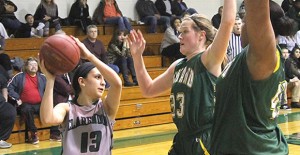 Clarendon’s Jae Carrasco tries to get past Midland’s Ellyn Avery. Enterprise Photos / Roger & Ben Estlack