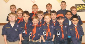 Clarendon Pack 437 members stand together after advancement ceremonies last Thursday. Enterprise Photo / Ashlee Estlack