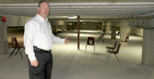 Clarendon ISD Superintendent Monty Hysinger shows off improvements to the school's storm shelter Tuesday morning, April 8.