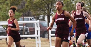 Sophomore, Amelia Weatherton, Junior, Abby Johnson and Senior Sarah Luttrell dominate the 200m at the District Track Meet Friday, April 11th in Panhandle.Enterprise photos / Alice Cobb