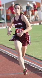 Sarah Luttrell runs the 100-meter dash. Enterprise Photos / Travis Harsch
