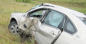 The crushed door of a Chevy Impala shows the impact that killed a Kansas man this week. Courtesy Photo / DPS