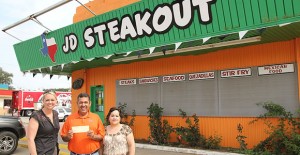 CEDC Director Chandra Eggemeyer with JD SteakOut owners Jesus and Dora Hernandez. Enterprise Photo / Roger Estlack