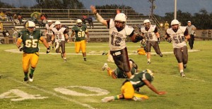 Clarendon’s Zack LaRoe tries to avoid Wolverine defenders during last Friday’s Homecoming football game in Bronco Stadium. Enterprise photo / Roger Estlack