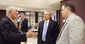 State Sen. Kel Seliger speaks with Herring Bank President Jerry Woodard and Clarendon College President Robert Riza during a town hall meeting at the Bairfield Activity Center last Friday. Enterprise Photo / Roger Estlack