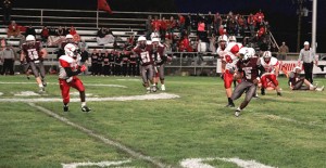 Charles Mason runs the ball for the Broncos during their game against Lockney Friday night. The Broncos gained their first district win defeating the Longhorns 20-19. Enterprise Photo / Roger Estlack