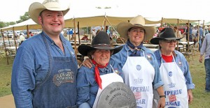 Members of the C Bar C Chuckwagon Team from Hartley show off the lid to their championship bean pot after winning the 20th annual Col. Charles Goodnight Chuckwagon Cookoff last Saturday, September 27. Enterprise Photo / Roger Estlack
