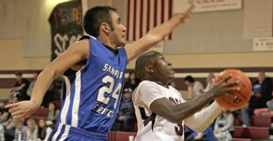 Charles Mason goes up to score for the Broncos. Enterprise Photo / Tara Allred