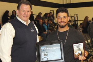 Dr. Robert Riza presented Michael Cruz with NJCAA and WJCAC awards. Enterprise Photo / Roger Estlack