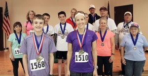 Gavin Word and Jennifer McIntosh (front) were the top finishers of the third annual Chance Mark Jones Roar ‘N Run 5K last Saturday at Clarendon College. Enterprise Photo / Roger Estlack