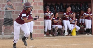After making a huge hit Taylor DeGrate runs to first while the Lady Broncos cheer for the dugout. The lady Bronco’s next game will be Tuesday, April 14, 2015 at home. Courtesy Photo / CHS