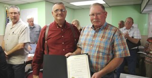 Mayor Larry Hicks declared last week Peace Officers Memorial Week during the May 14 city meeting and presented a signed proclamation to Donley County Sheriff Butch Blackburn recognizing the service of local law enforcement. Enterprise Photo / Roger Estlack