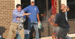 Clarendon College Athletic Director Brad Vanden Boogaard (left) demonstrates his good aim during an impromptu water balloon fight during a Back-To-School Bash on Monday. CC students moved into the dorms over the weekend, and fall classes began Wednesday. Enterprise Photo / Roger Estlack