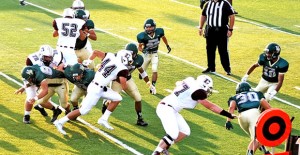 Offensive Linemen Taylon Knorpp, Cooper Bilbrey, Caleb Cobb, and Seth Greer work together to move the Broncos closer to the end zone. Enterprise Photo / Alice Cobb