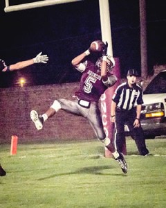 Junior Ceniceros catches a pass in the end zone to score for the Broncos. The Broncos stop the Gruver Greyhounds 21-7 last Friday night. Courtesy Photo / Bobby Thomas/ DR. Rock’s photography