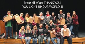 Clarendon High School drama students hold boxes of equipment received from a grant last week. Courtesy photo / CHS