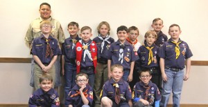 Fourteen local Cub Scouts from Pack 437 recieved rank advancements and other achievements at the annual Blue & Gold Celebration held Monday, February 29. Scouts reconized were Jakoby Dunham, Daniel Estlack, Henry Bivens, Eli Ritchie, Nathan Estlack, Kayden Cummings, Ben Estlack,  Mason Allred, Haughton Bivens, Kaendan Moffett, Logan Mathis, John Holt, Steven Mills, and Jacob Murillo. Not pictured: Patrick Monds. Enterprise Photo / Tara Allred