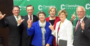 Clarendon College President Robert Riza (left) and officials from Texas Tech University Health Science Center get their guns up Thursday morning in celebration of the new articulation agreement signed between the two schools. Enterprise Photo / Ashlee Estlack