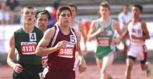 Bryce Grahn outpaces several competitors in the 3200 last week. Enterprise Photo / Travis Harsch