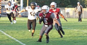 Clarendon Sophmore Preston Elam with the ball during the Bronco’s game last Friday against the Wheeler Mustangs. The Broncos will travel to Gruver at 7:30 p.m. on Friday, September 16.  Enterprise photo / Roger Estlack 