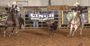 Clarendon College’s Kyle Hash (left) made the finals in the Team Roping and won second in the finals and split 2nd and 3rd in the average during the Stampede NIRA Rodeo at CC’s Livestock & Equine Center Saturday night. Photo by Richard “Whitty” Whittenburg / Two Dog Enterprises
