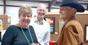 Cindy and Jim Shelton visit with Don Thornberry during the Preferred Buyers’ Reception at the Clarendon Arts Festival last Thursday,  October 20, at the Donley County Activity Center. Enterprise Photo/ Roger Estlack