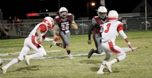 Keandre Cortez blocks for Clint Franks as they make their way down the field during last Friday’s home game against Wellington. The Broncos head to River Road for the Bi-District Championship against Wheeler on Thursday, November 10, beginning at 7:00 p.m. Enterprise Photo / Morgan Wheatly